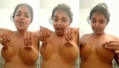 Sexy Girl Playing with Her Boobs